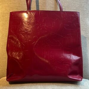 Prada red embossed leather bag